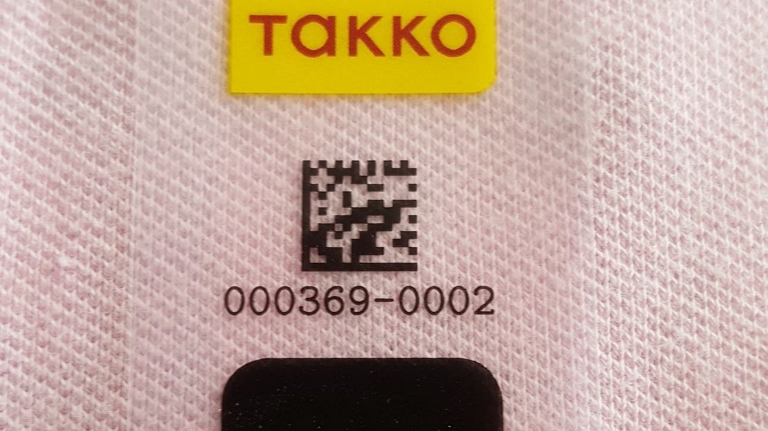 foto van inotec barcode RFID textiel etikettering Takko detail